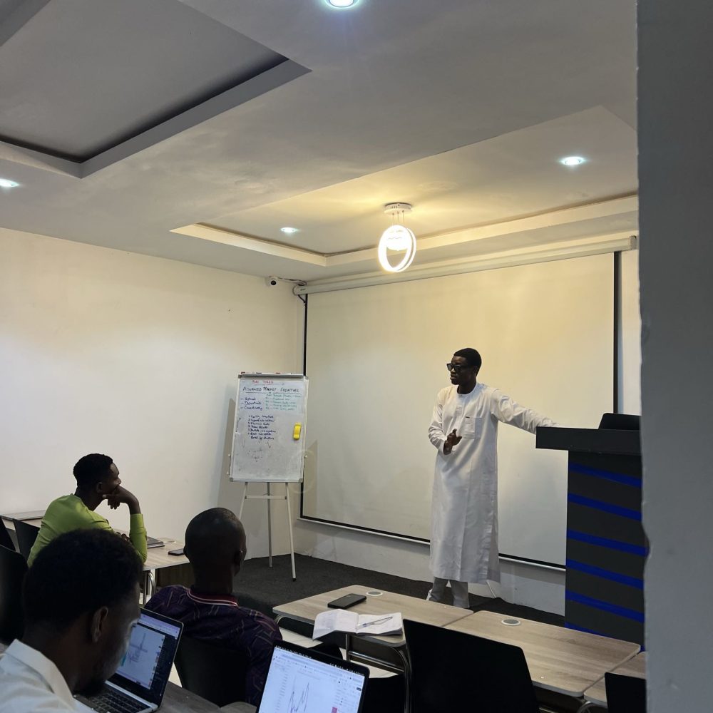 An ESTT tutor leading a product marketing session